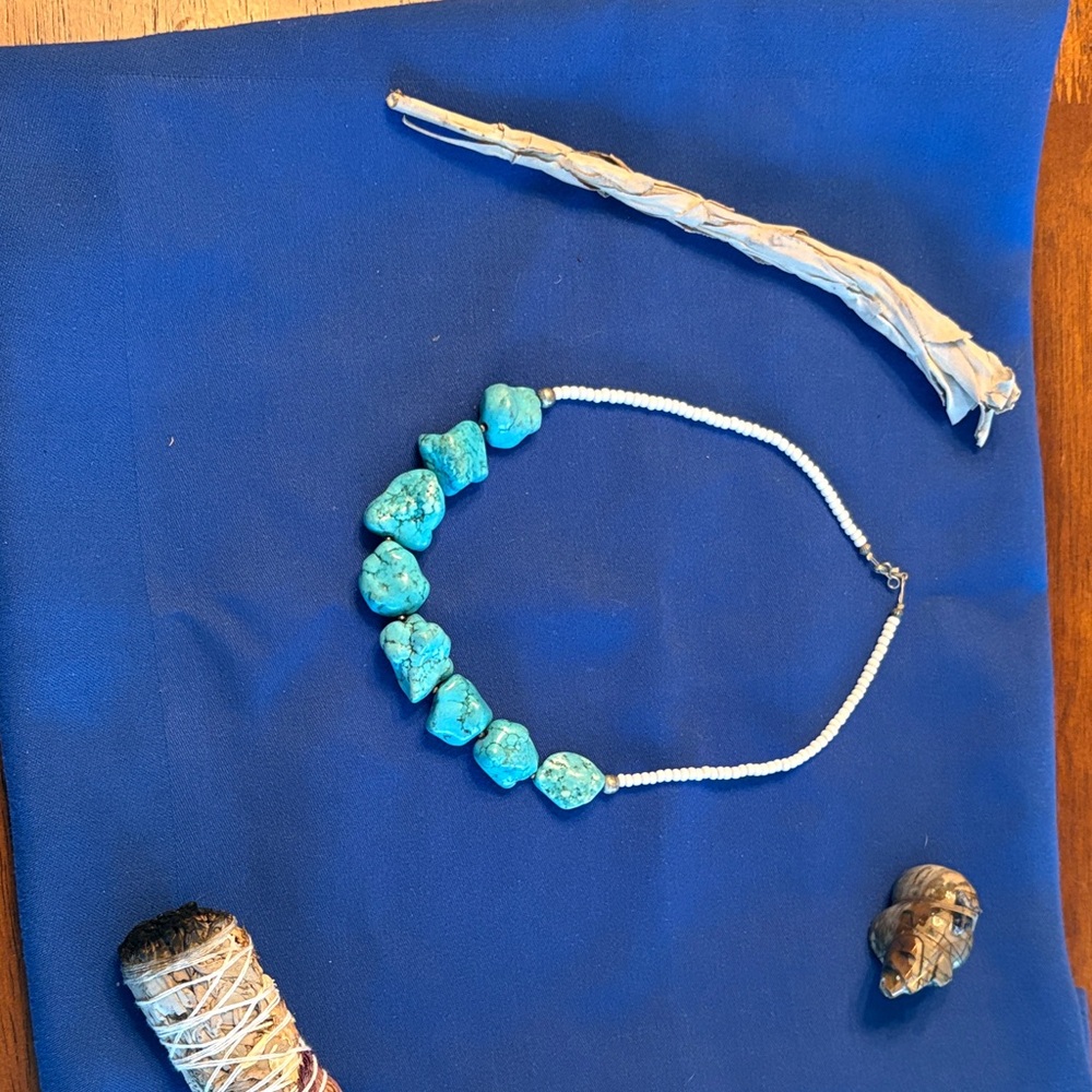 Native made Turquoise and White Beaded Necklace with large pieces of turquoise.